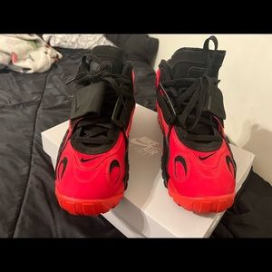 Red and Black Nike air max speed turf